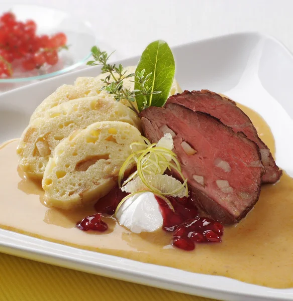 Sirloin of beef with cream sauce and dumplings