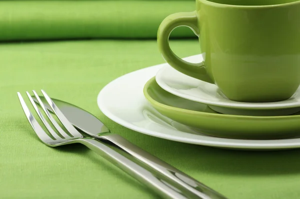 Green and white dishware