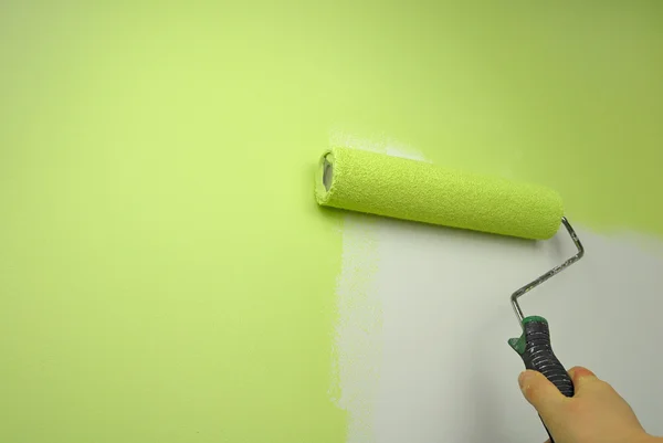 Hand painting wall in green color