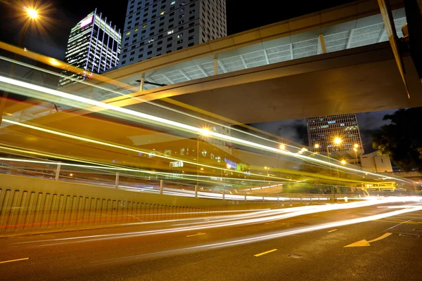 Car light in city by Leung Cho Pan Stock Photo Editorial Use Only