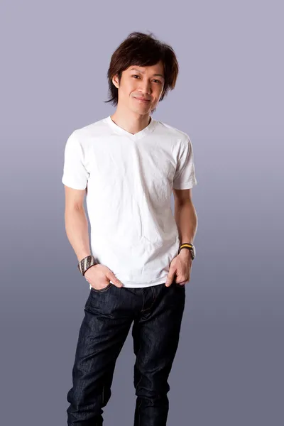 Smiling Asian man in white shirt