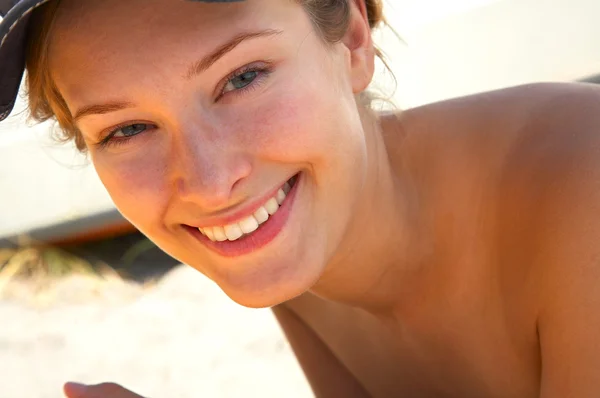 Young girl relaxing at the beach by Yuri Arcurs Stock Photo