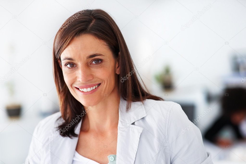 Portrait of beautiful middle aged businesswoman working on laptop Indoors depositphotos 3302104 Closeup of a smiling beautiful mature woman Portrait of beautiful middle aged businesswoman working on laptop Indoors