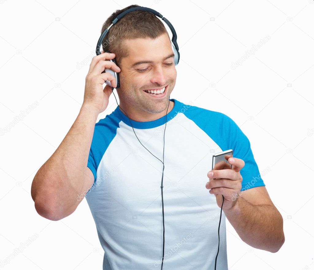 depositphotos_3358039-Happy-guy-enjoying-favorite-songs-on-mp3-player-on-white.jpg