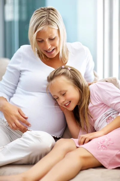 Beautiful pregnant woman Stock Photo 6882001. Beautiful pregnant woman dep 3367865 Cute young girl listening her pregnant mothers belly Beautiful pregnant woman Stock Photo 6882001. Beautiful pregnant woman