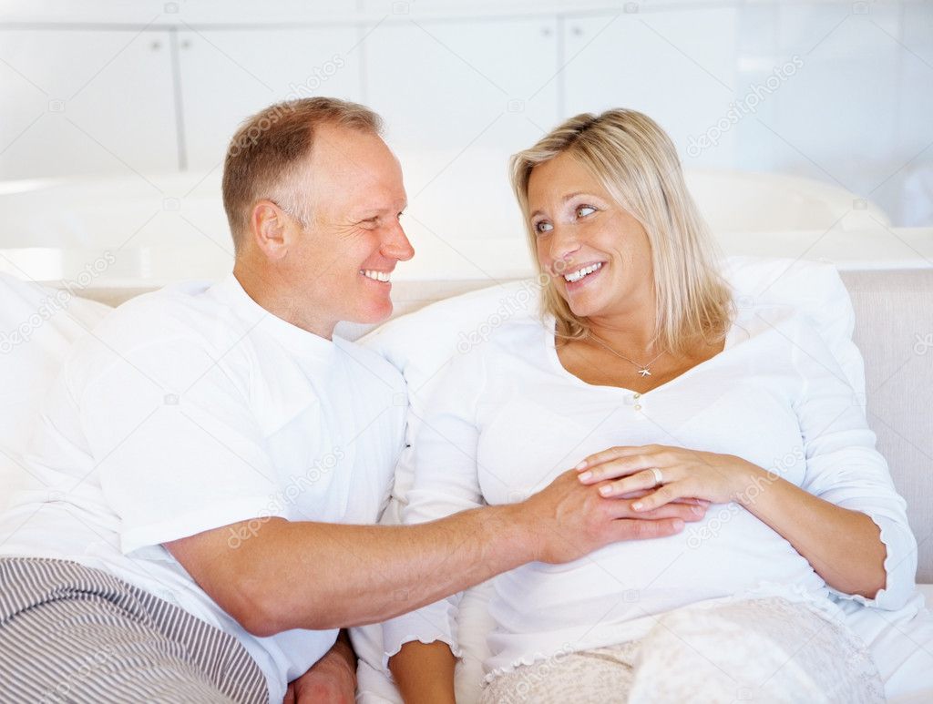at The Adult Film Industry depositphotos 3368725 Happy middle aged man touching his pregnant wife tummy at The Adult Film Industry