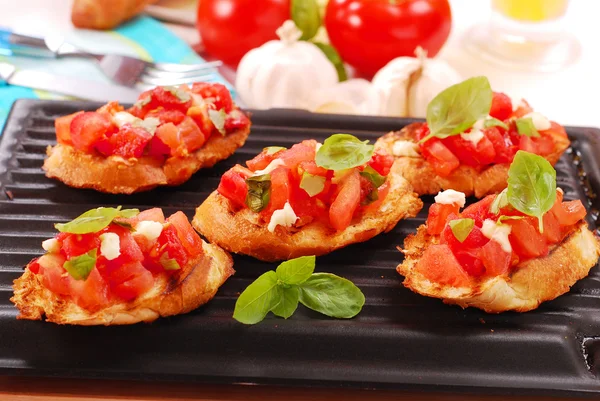 Bruschetta toasted on electric grill