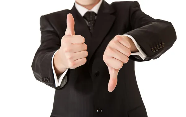 Business man in suit thumbs up and down on white isolated backgr — Stock Photo #3856209