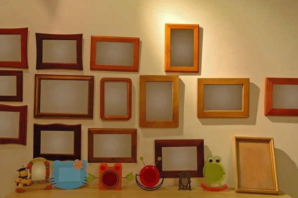 The photo frames on wall