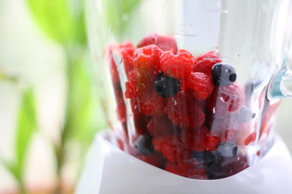 Fresh berry mix in blender