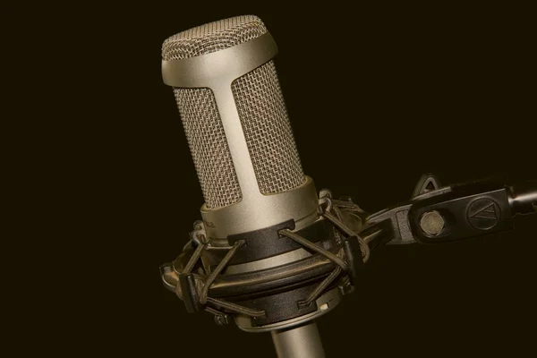 Studio microphone on a black background