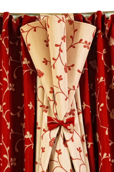 Red curtain with a bow