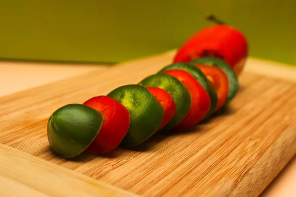 Sliced red and green jalapeno pepper