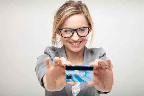 Woman holding new credit card