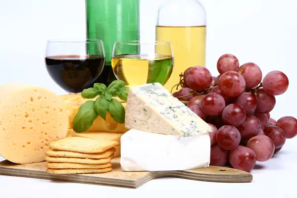 Various types of cheese and wine