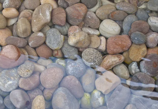 Pebbles in and out of water