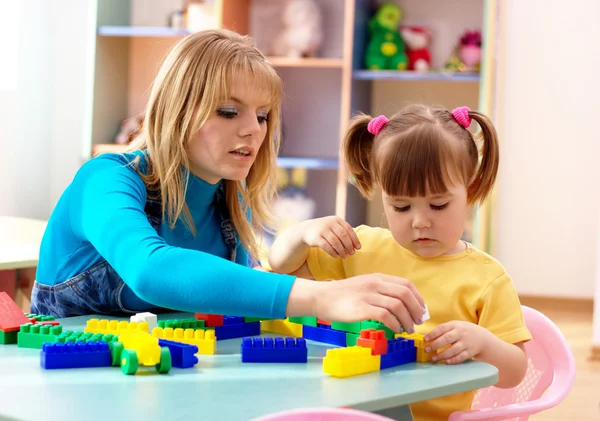 Teacher And Preschooler - Stock Image - Everypixel