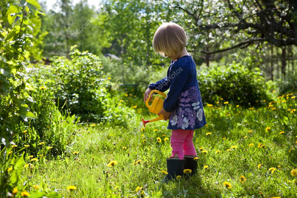 Girl Watering Flowers