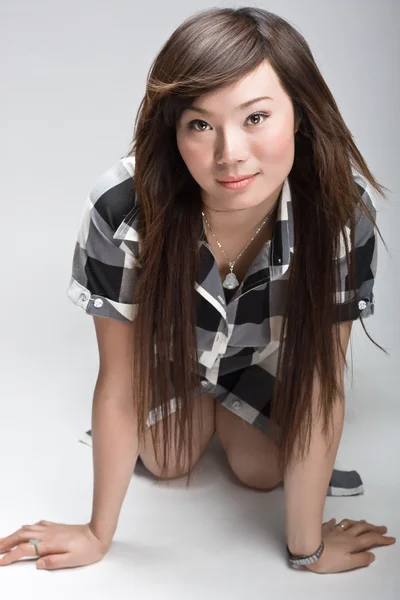 Gorgeous asian beauty on knees — Stock Photo #3182606