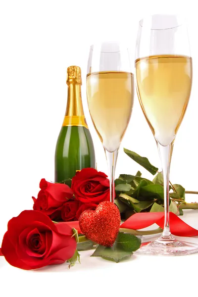 Champagne glasses with roses and little heart