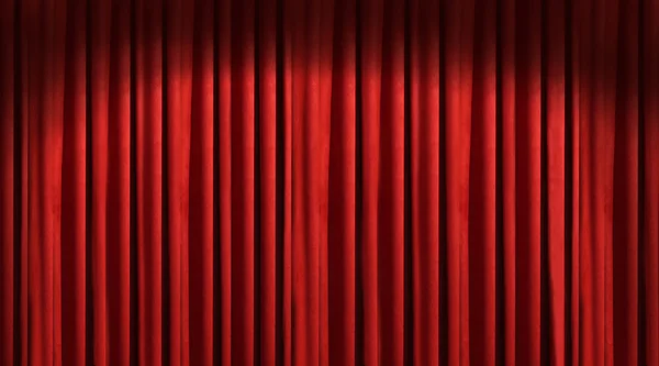 Red theater curtain with dark shadows