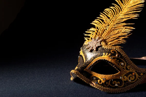 Black and gold mask