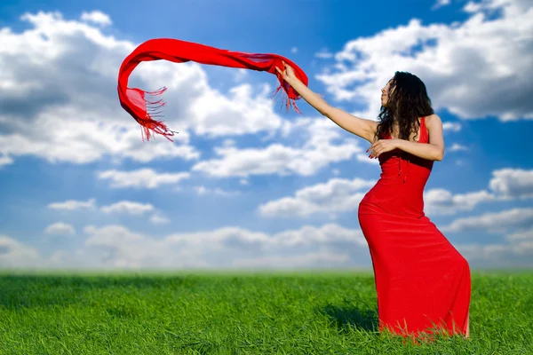 Girl in a red dress and with a red shawl — Stock Photo #3731028