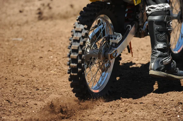Motorbike tyre on dirt track