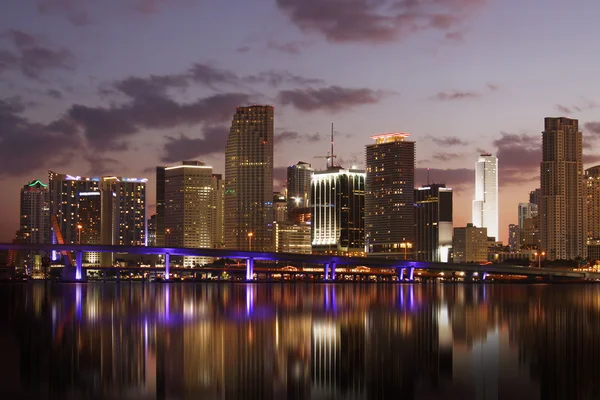 Miami Skyline at night reflecting in water