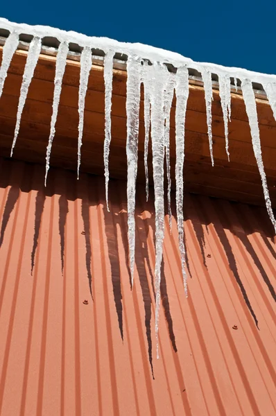 stock image Big icicles on the roof