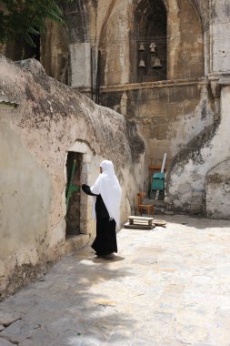 On the roof of the Church of the Holy Sepulchre clipart