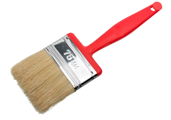Single brush with red plastic handle — Stock Photo, Image