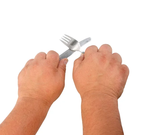 Två tjocka händer med kniv och kontakt — Stockfoto