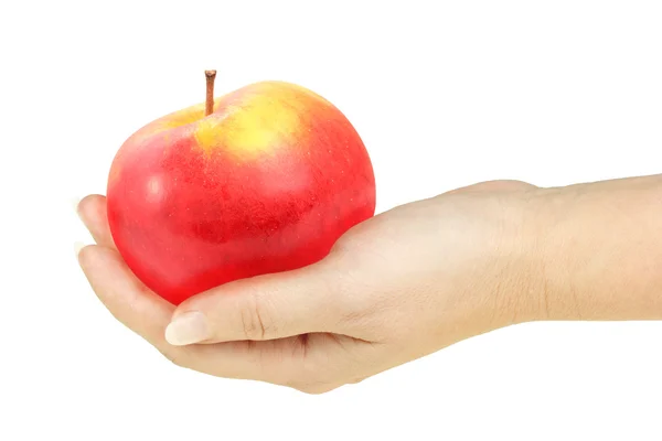 Einzelner roter Apfel in der Hand einer Frau — Stockfoto