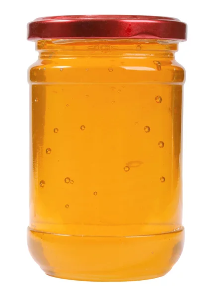 stock image The only closed glass jar with honey