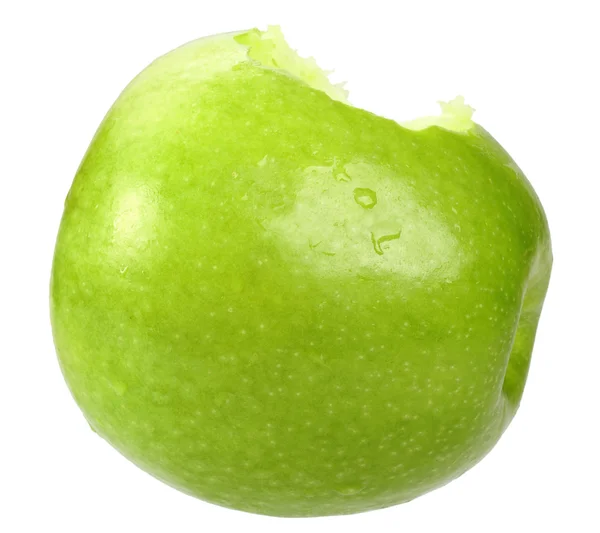 Одно зеленое яблоко с укусом — стоковое фото