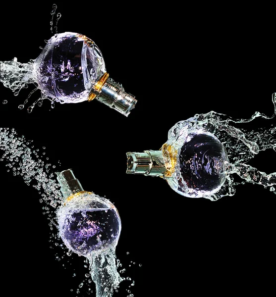 Set perfume bottle on water splash — Stock Photo, Image