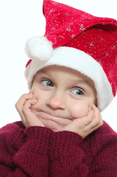Cara engraçada de criança vestindo vermelho Santa — Fotografia de Stock