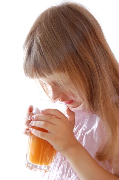Little girl with carrot juice. — Stock Photo, Image