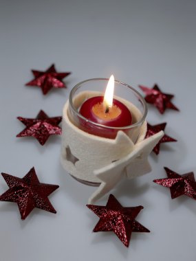 Holiday's still-life with candle clipart