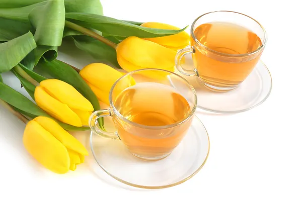 Čaj a tulipány — Stock fotografie