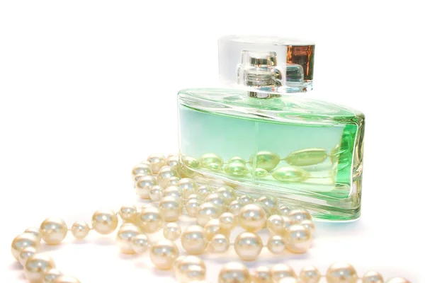Perfume and necklace — Stock Photo, Image