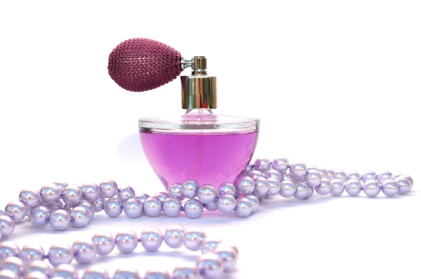 Perfume and necklace — Stock Photo, Image