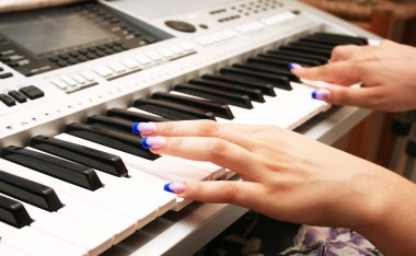 Playing keyboard clipart