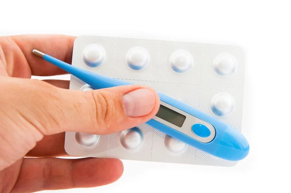 Cyfrowy termometr i tabletki — Zdjęcie stockowe