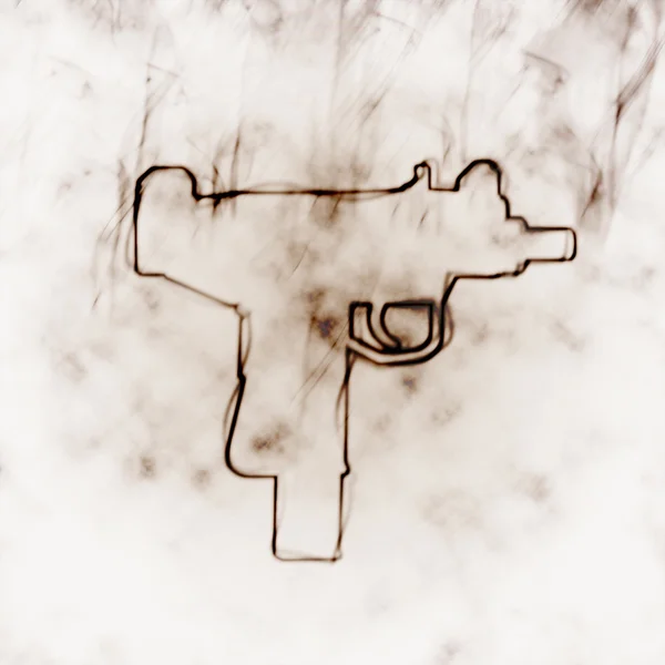 Pistolet dans la fumée — Photo