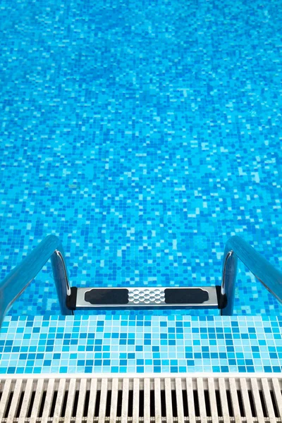 Part of swimming pool with ladder — Stock Photo, Image