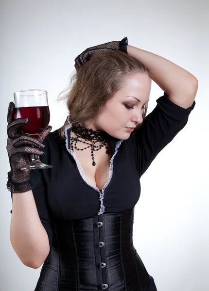 Sexy joven mujer con vino tinto —  Fotos de Stock