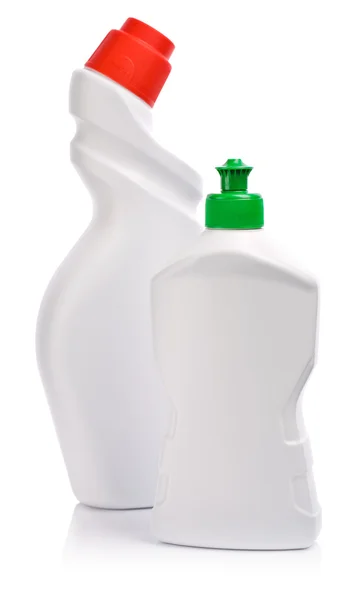 Weiße Flaschen mit grünem und rotem Deckel — Stockfoto