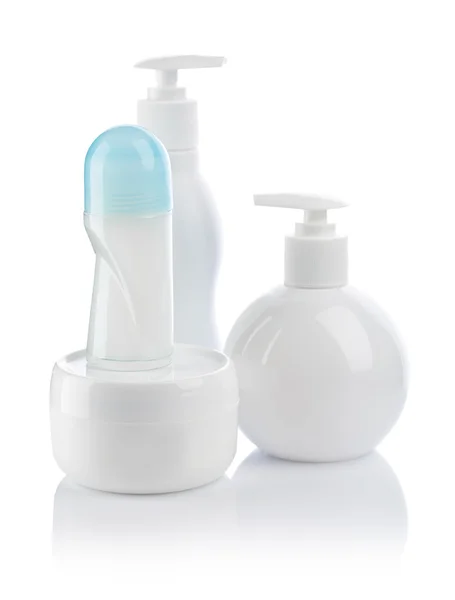 Deodorant and tubes cream — Stock Photo, Image